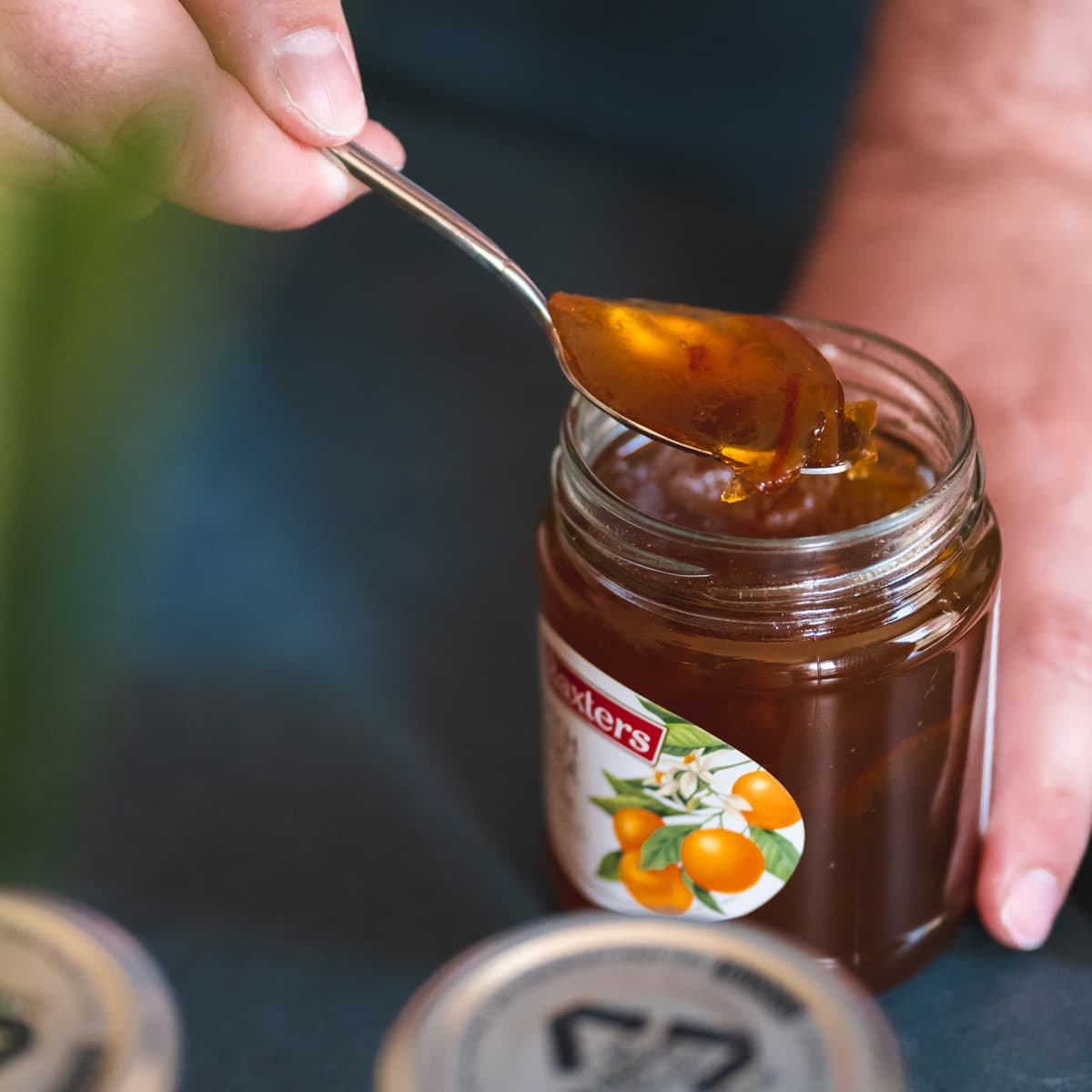 Marmalade being scooped with a spoon